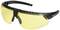 Safety glasses with yellow lenses and black frame, suitable for workplace protection.