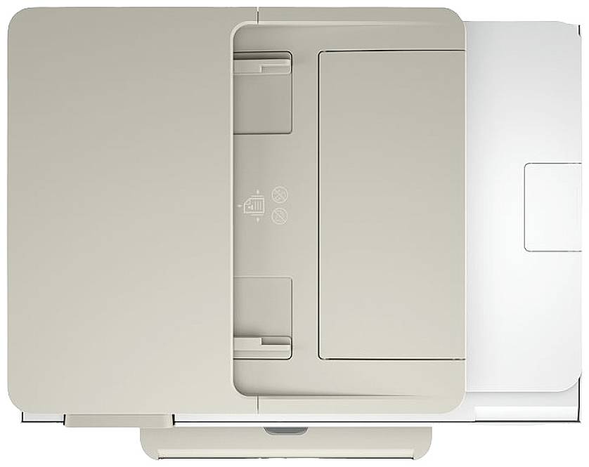 Top-down view of a white printer with an open paper tray and symbols indicating paper orientation and a no-staples icon.