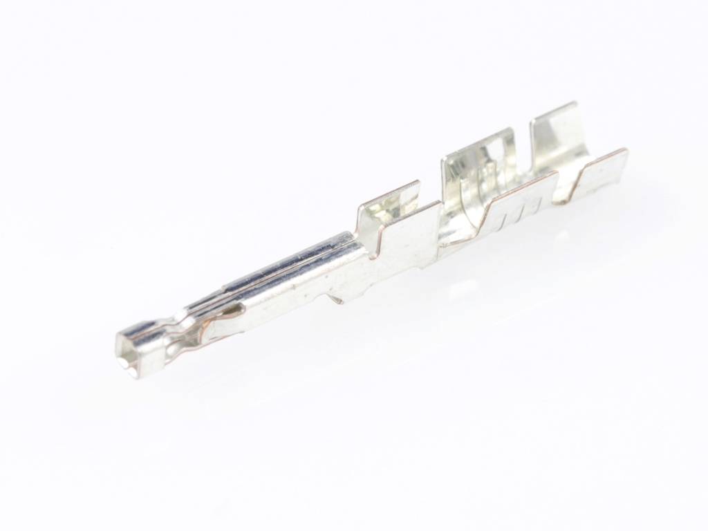 Metal contact of a cable connector on a white background, showing the details and shape of the connector element.