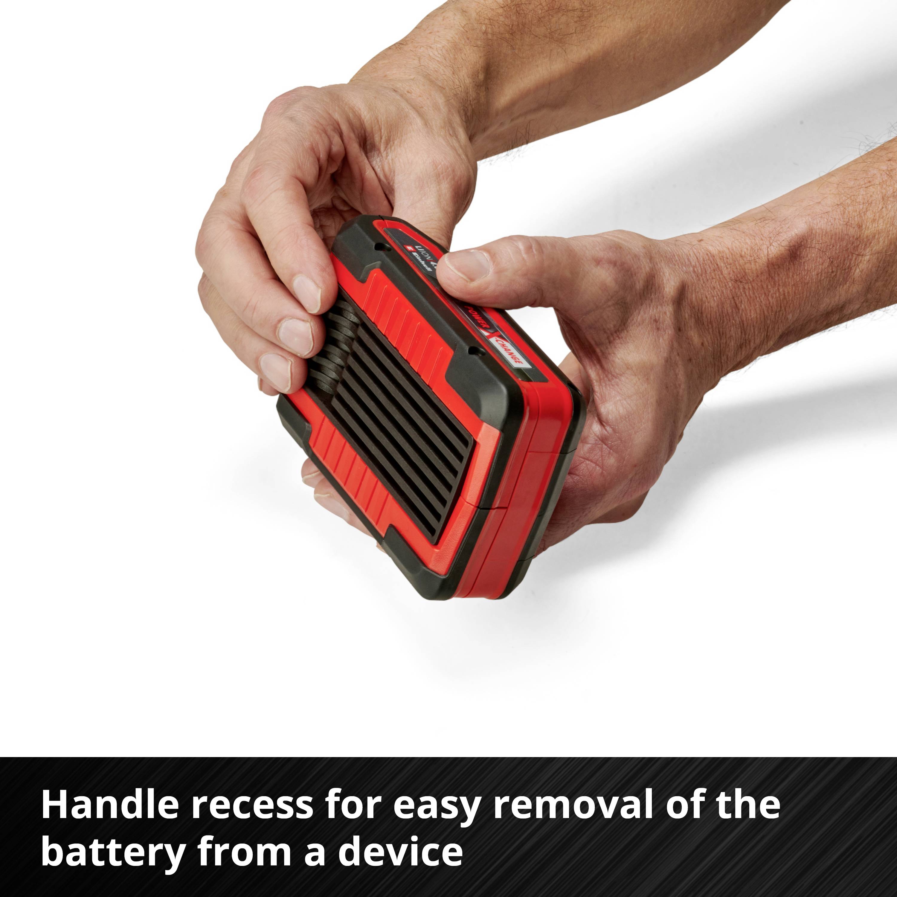 Two hands are holding a red battery with a black handle. Text below: 'Grip recess for easy removal of the battery from a device'.