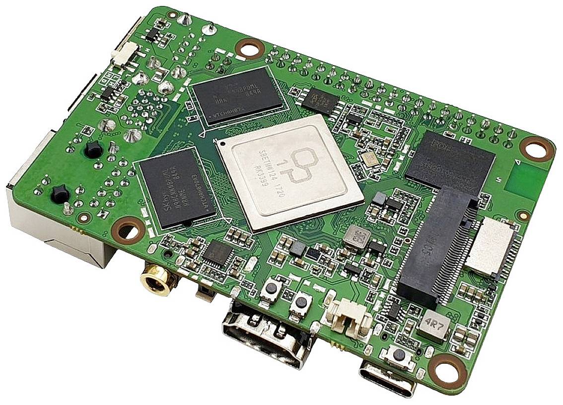 Circuit board of a single-board computer with multiple chips and ports, including HDMI, USB and Ethernet. Ideal for electronics projects.