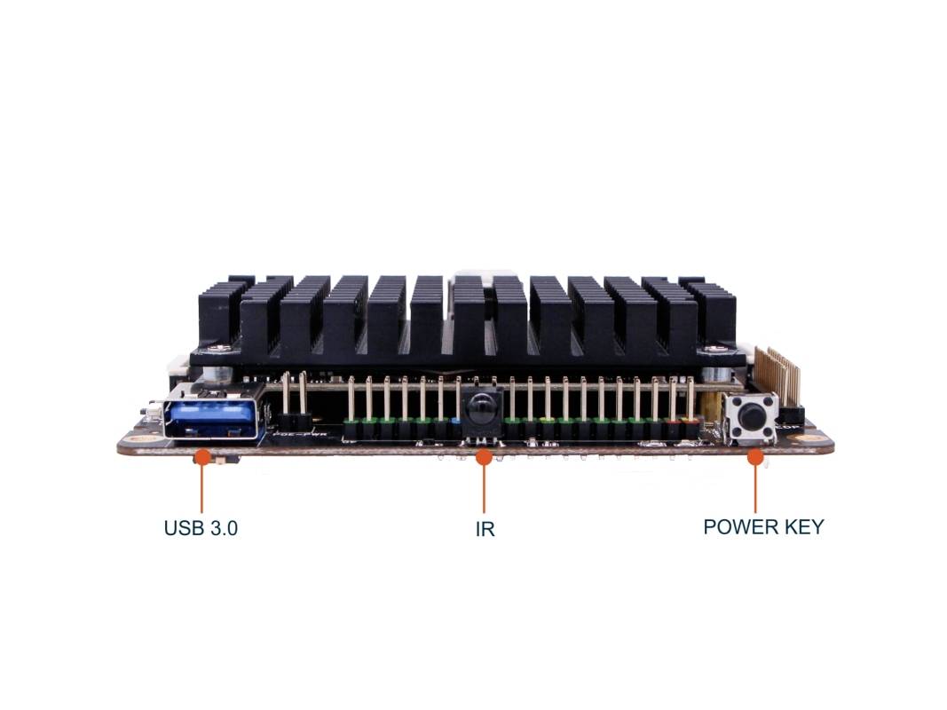A microcontroller board with a heatsink. Labelled: 'USB 3.0', 'IR', 'POWER KEY'. Shows connections and buttons on the front panel.