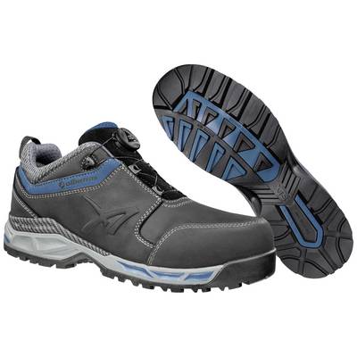Black safety shoes with silver stitching and blue accents, robust rubber sole. Showing a side view and bottom view.