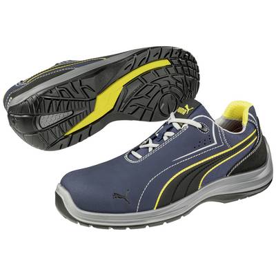 Blue and black sports trainer with yellow accents. Upper shows shoe design, sole displays tread pattern.