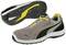 Grey sports shoe with a black stripe and yellow accents, yellow laces, specialised tread sole for improved grip.