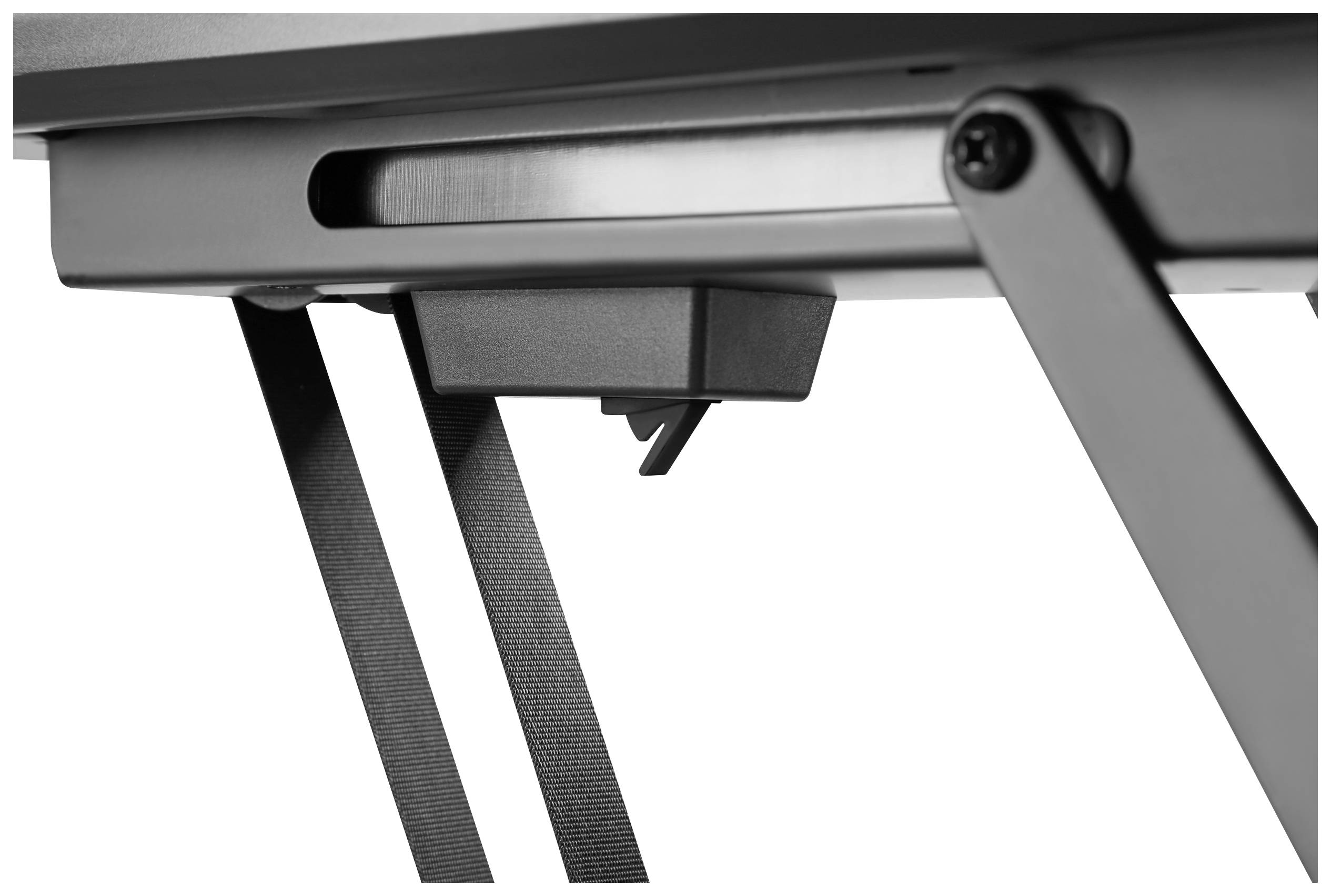 Underside of a desk with two struts and a black box mounted to the desktop. Office screw visible.