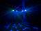 Multicoloured laser show with green, red and blue beams in a dark room. Beams intersect and create a vibrant pattern.