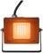 An orange LED spotlight with a black cable, mounted on an adjustable metal stand, shines intensely.