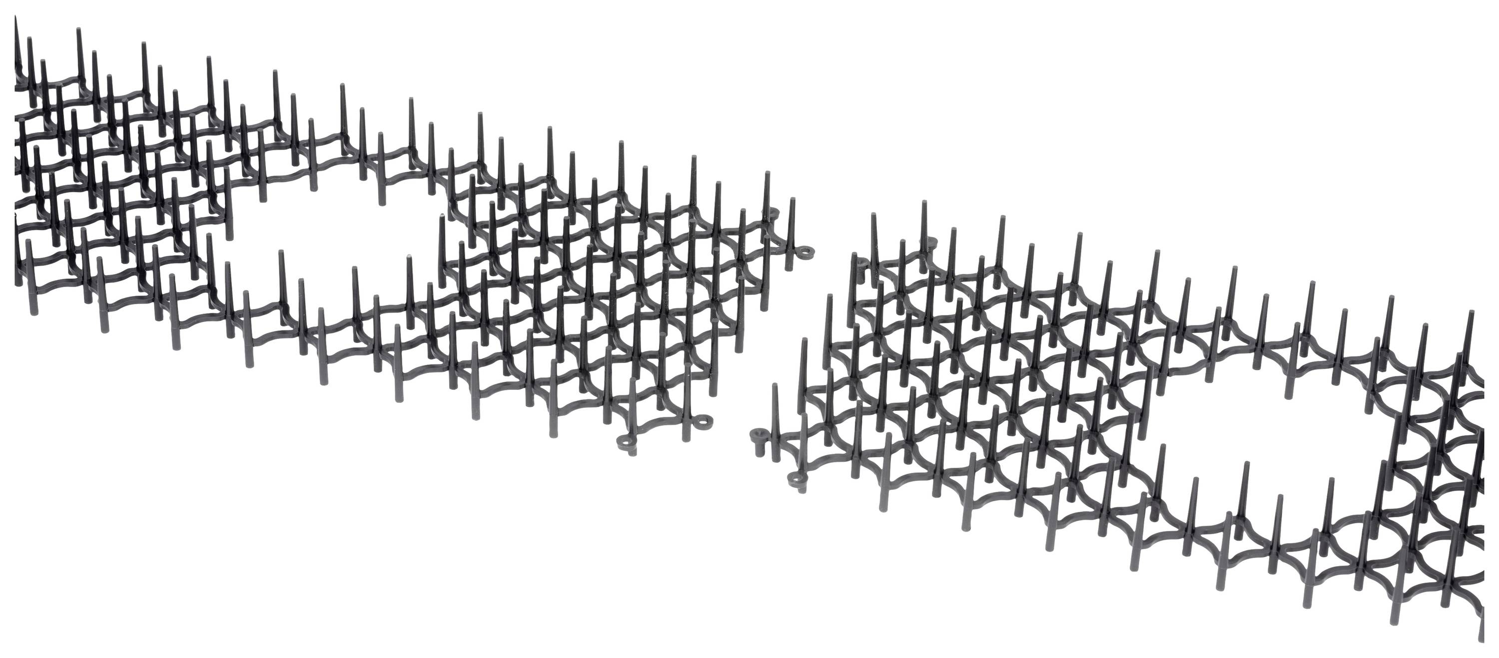 Two black grid structures side by side, each with a round hole in the centre.