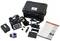 Portable fibre optic fusion splicer with accessories: protective case, cables, adapters and manual laid out on a table. Ideal for fibre optic installation.