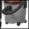 A grey vacuum cleaner with a black hose and wheels, suitable for use on various floor types.
