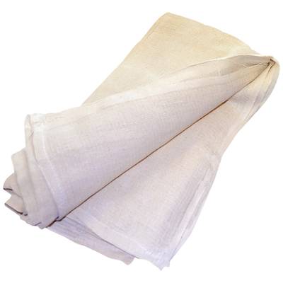A folded linen cloth in a light shade, lying on a white surface.