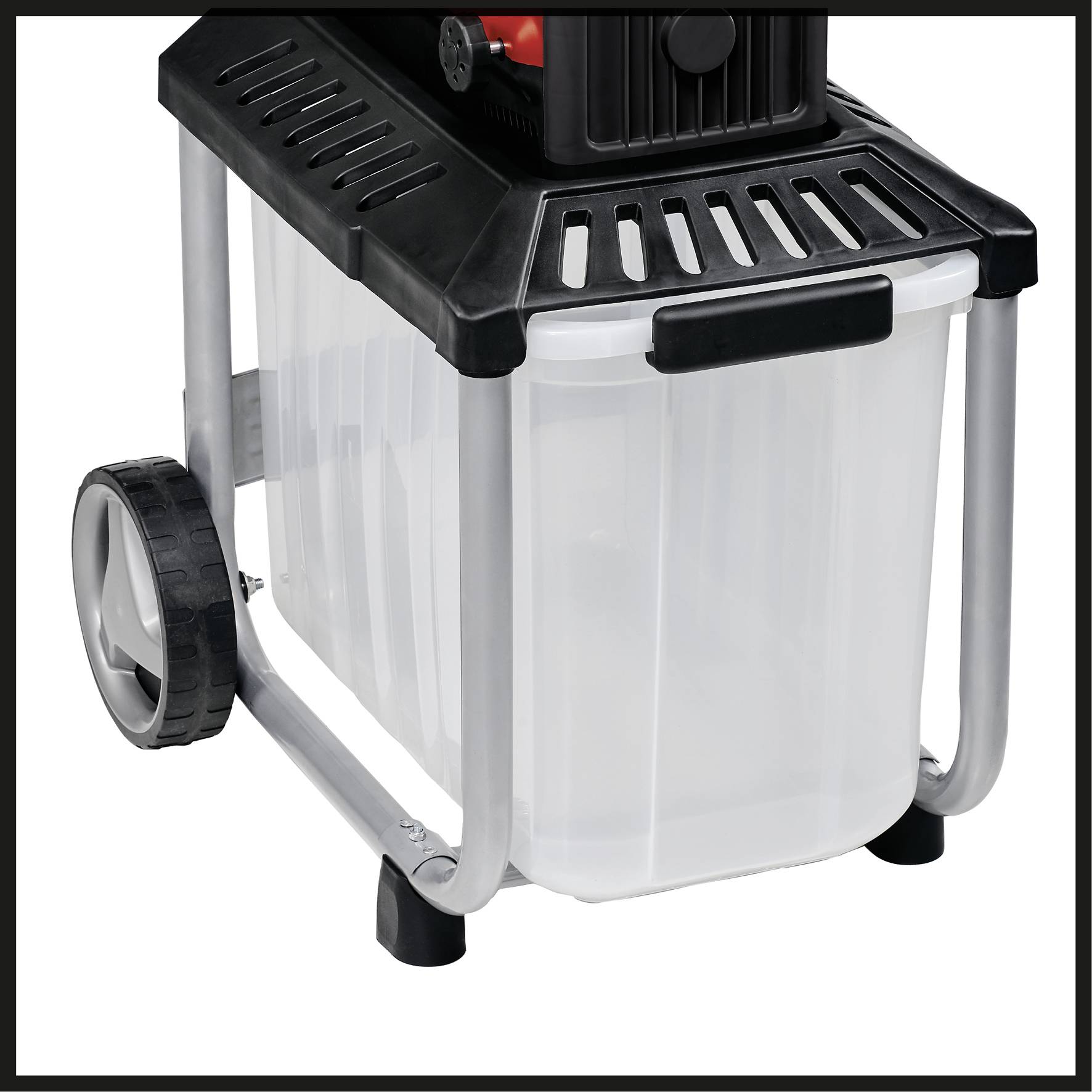 A transparent container with black edges and wheels, possibly part of a garden implement for collecting waste.