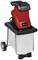 Garden shredder with red and black elements and a sturdy stance, equipped with wheels and an integrated collection bin.