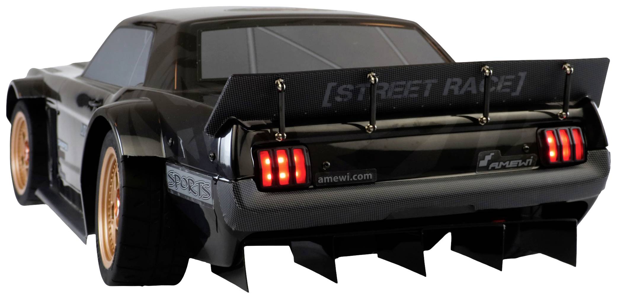 RC car with black bodywork, large golden alloy wheels, and illuminated rear lights. Text on the rear spoiler: 'STREET RACE'.