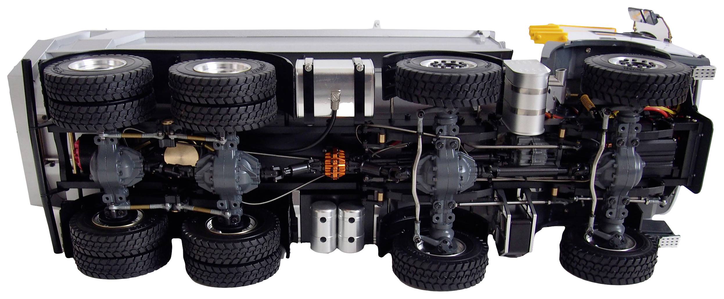 Underside view of a lorry with detailed visibility of axles, wheels, and chassis, showcasing technical components and construction.