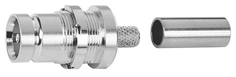 Metallic coaxial plug in individual components: plug housing and hollow cylindrical part shown separately, detailed view.