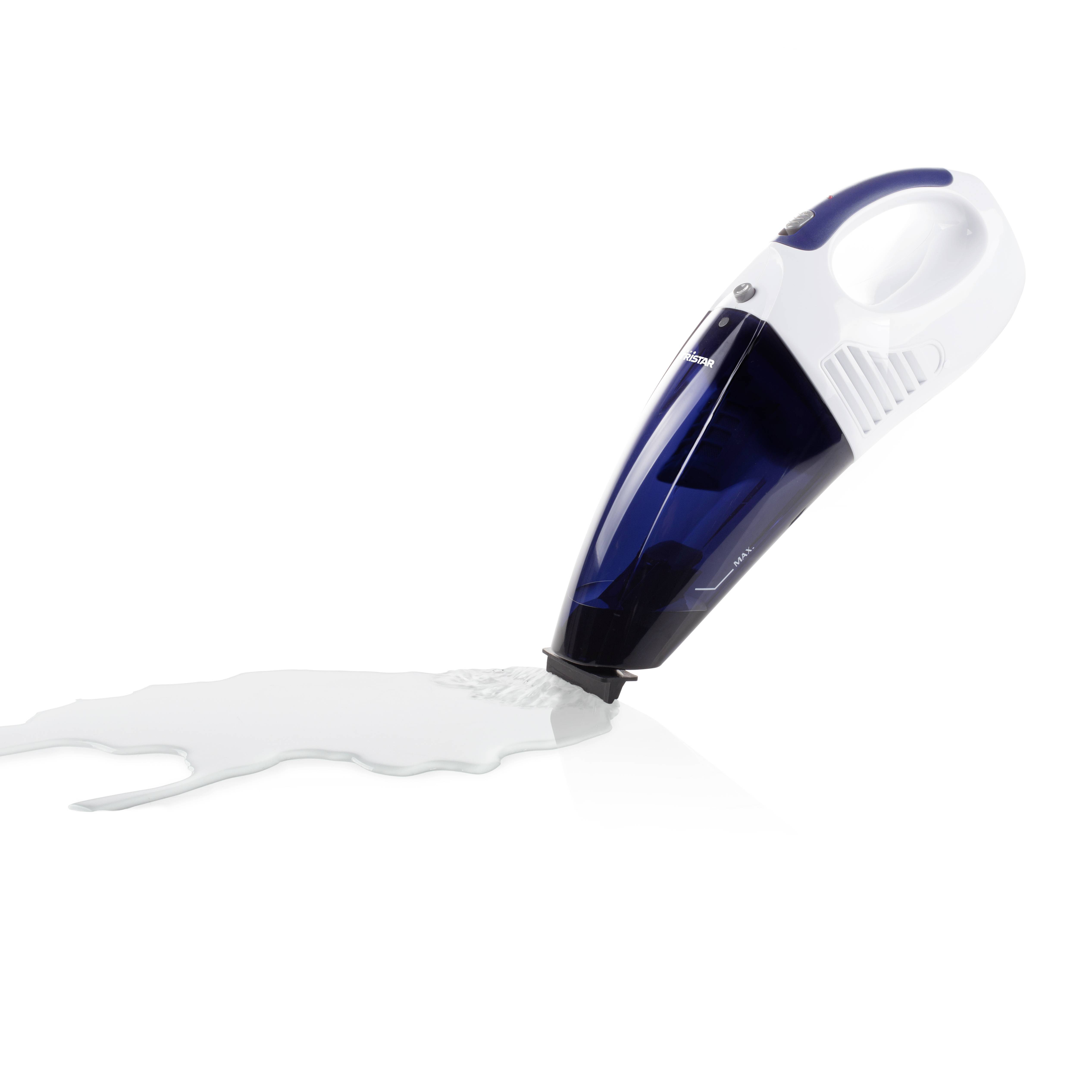 A handheld vacuum cleaner is sucking up a spilled liquid. The device is blue and white, suitable for wet and dry vacuuming.