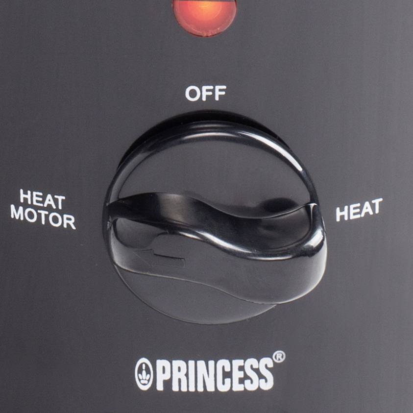 Black control panel of a device with a rotary dial: Options 'Off', 'Heat Motor', 'Heat'. Red light above the dial.