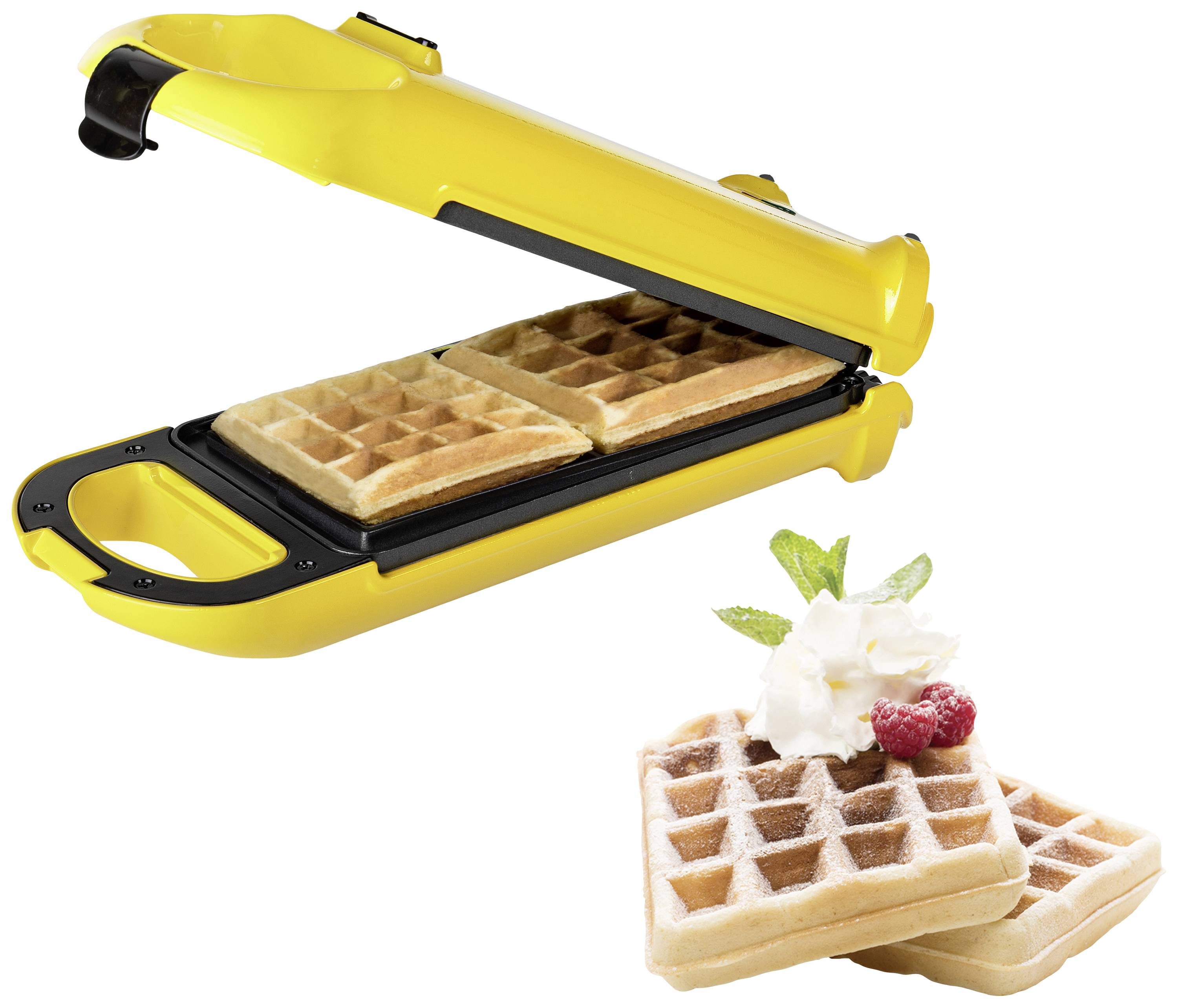 Yellow waffle iron with two freshly baked waffles. Beside it are finished waffles garnished with cream, raspberries, and mint leaves.