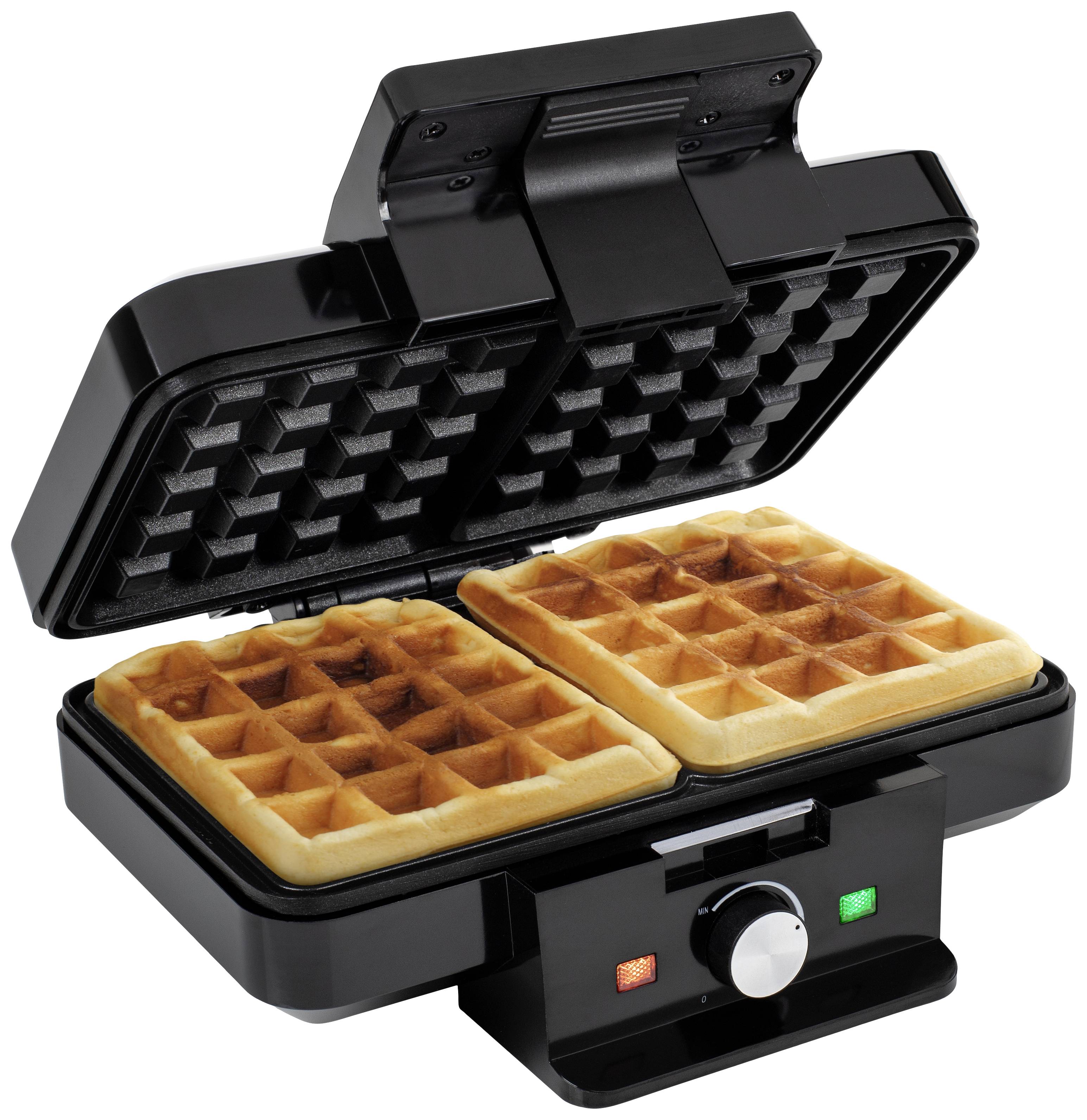 A black waffle maker with two golden-brown waffles, open, reveals an even waffle pattern. Small indicator light and dial are visible.
