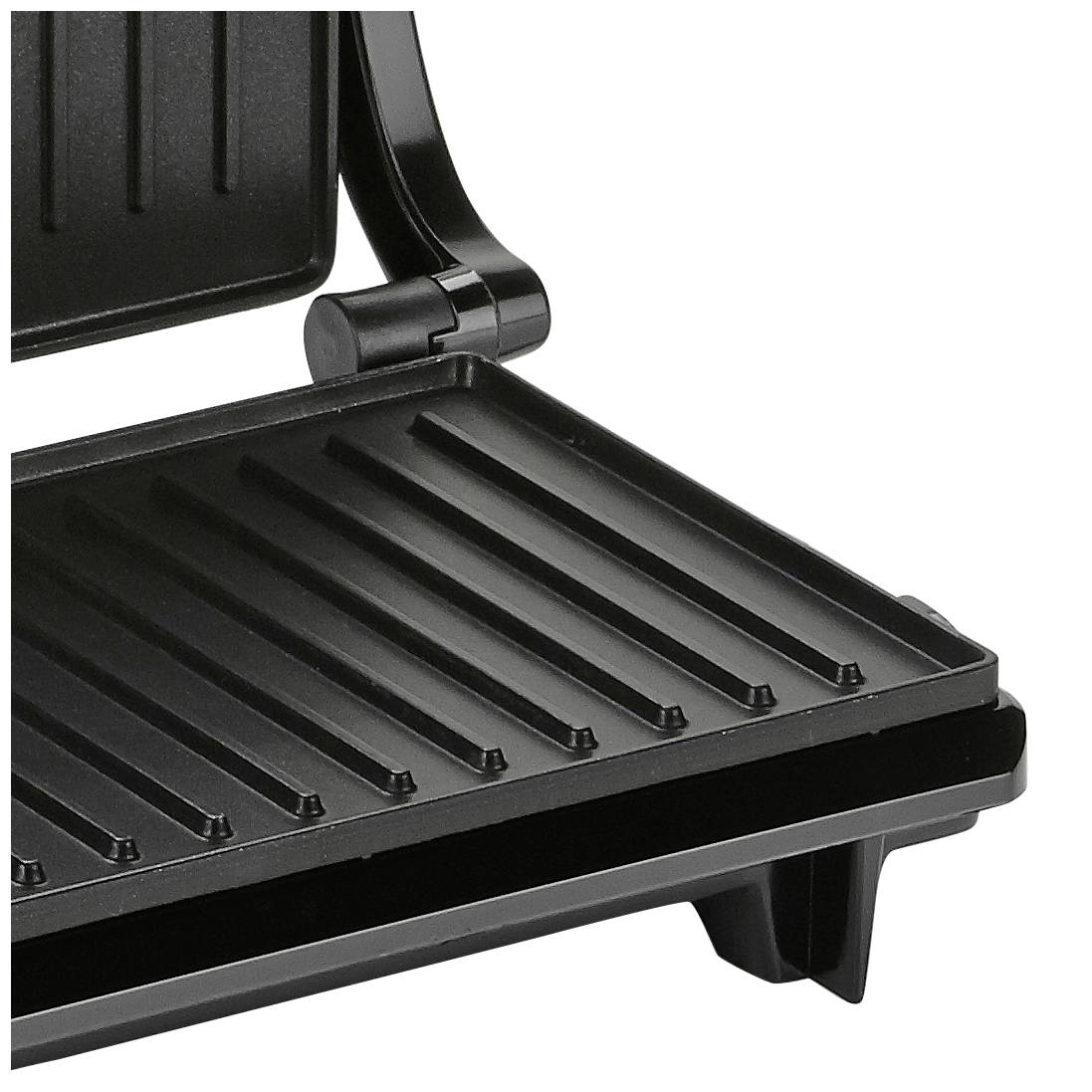 Open contact grill with ridged grilling surface, suitable for grilling meat, vegetables or sandwiches.