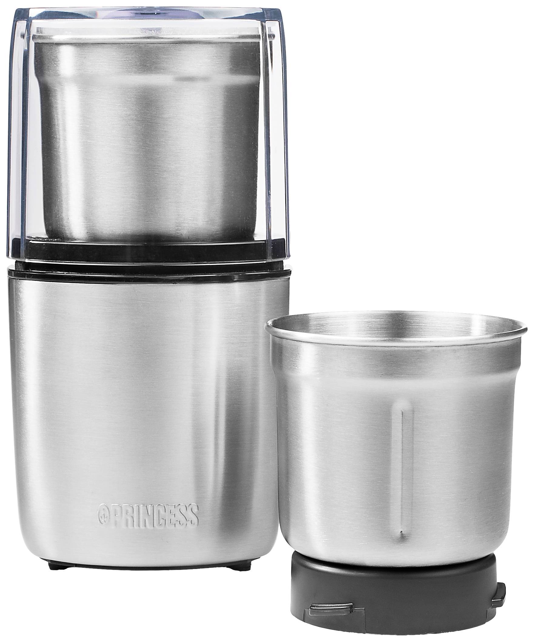 A silver-coloured, compact coffee bean grinder next to its accompanying, empty stainless steel cup.