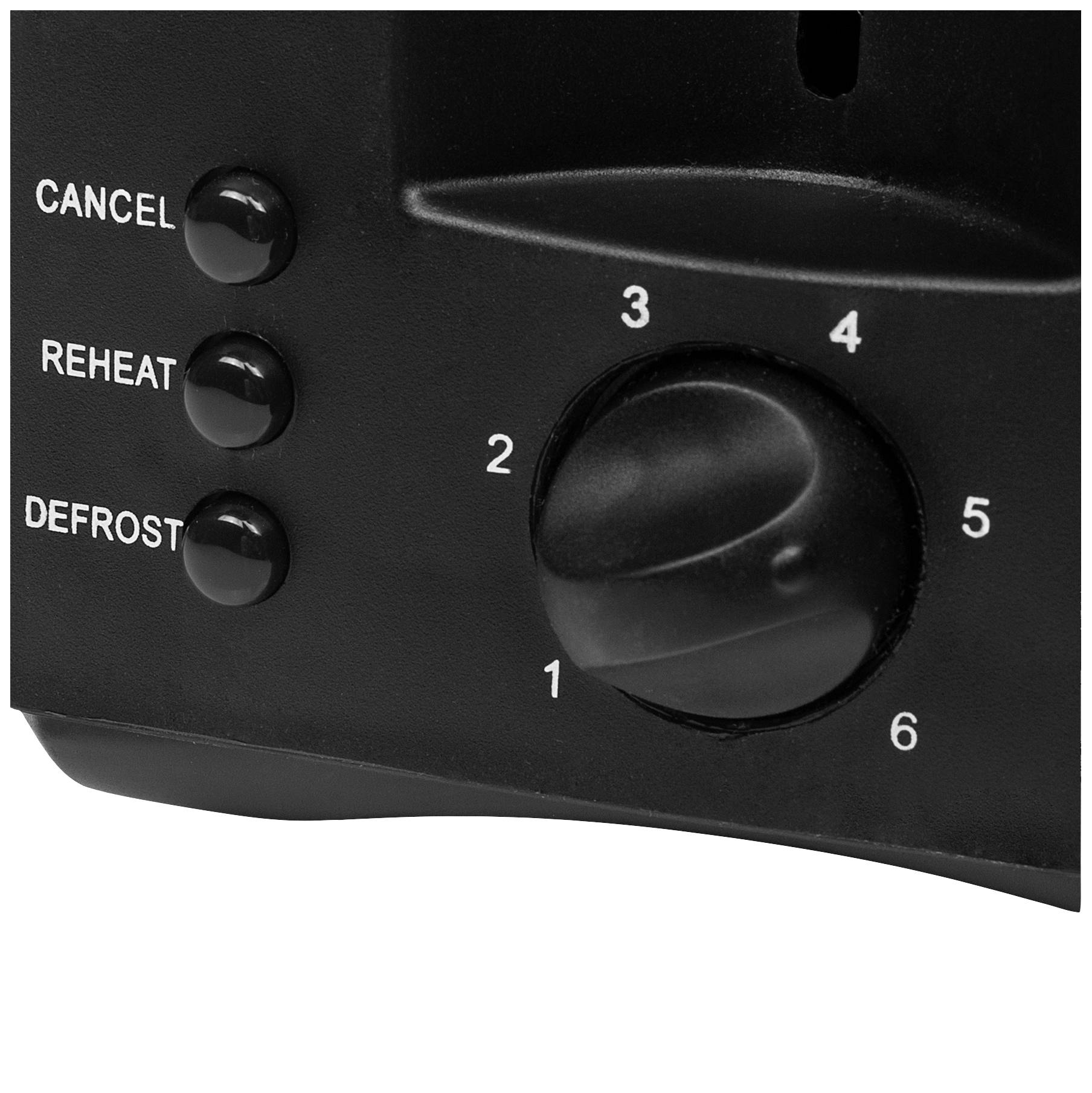 Close-up of a toaster: On the left are the buttons 'Cancel', 'Reheat', 'Defrost'. On the right, a temperature dial ranging from 1 to 6.