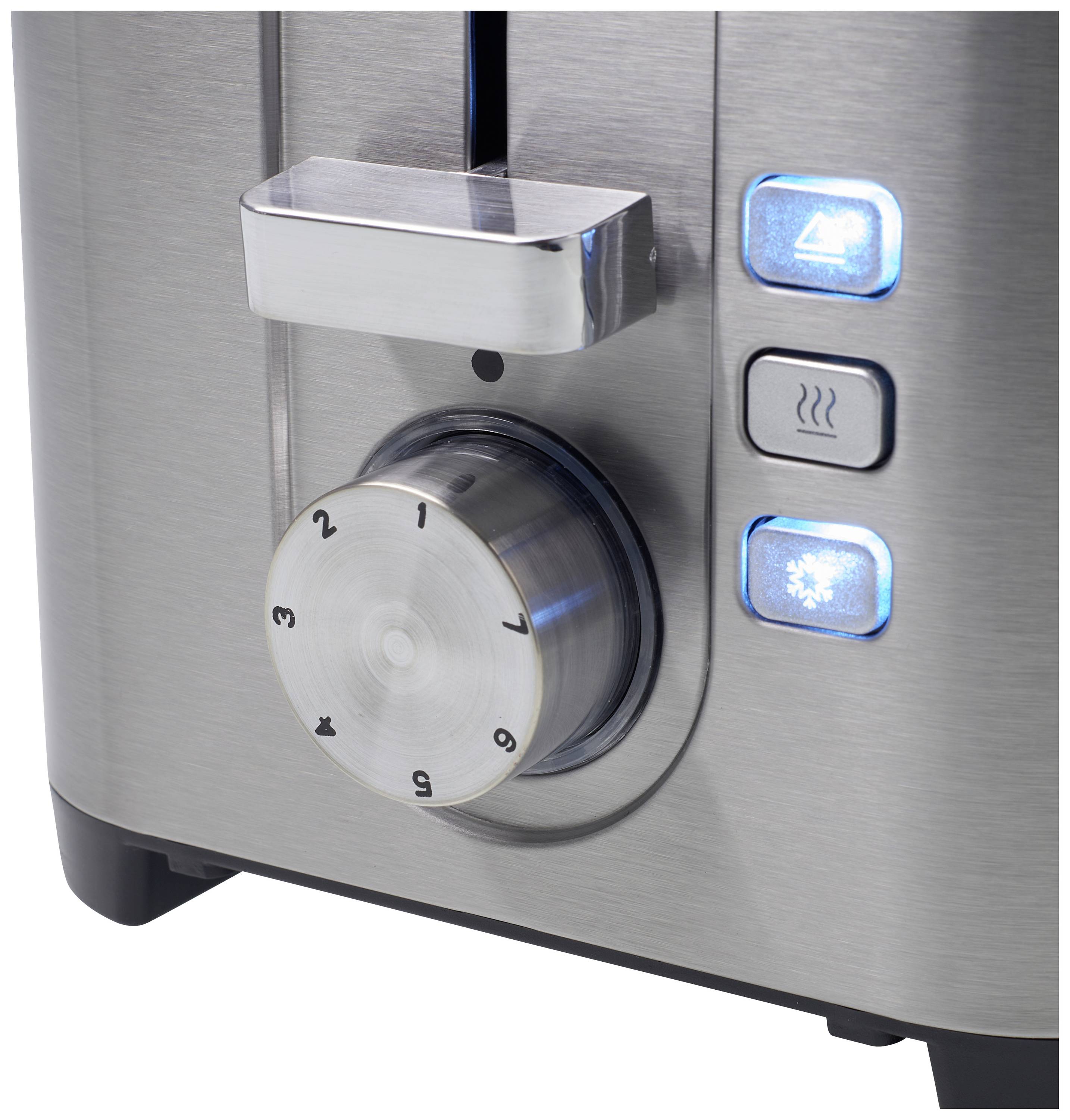Close-up of a stainless steel toaster with a dial for heat settings from 1 to 9 and illuminated buttons for defrosting and reheating.