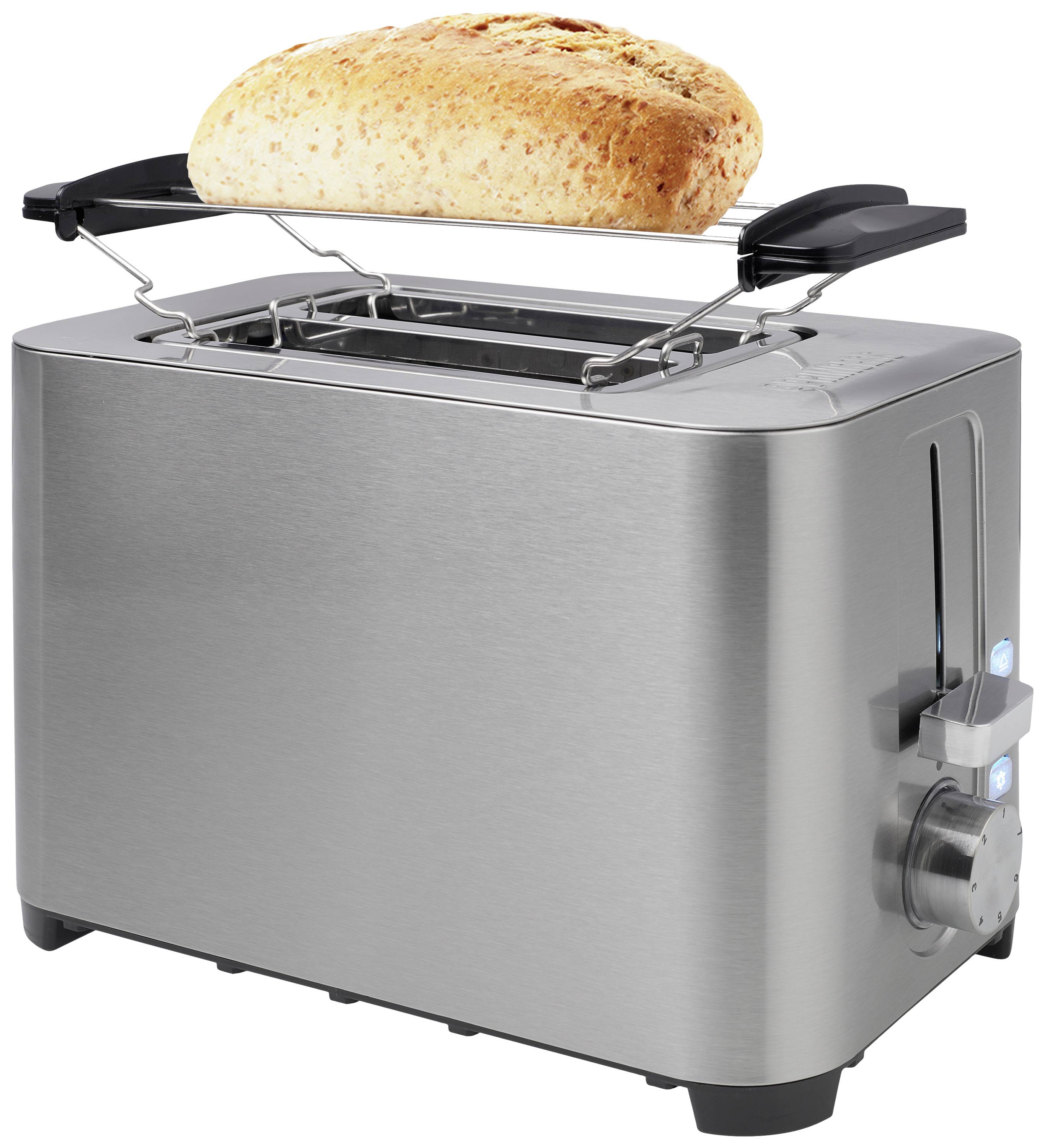 A stainless steel toaster with a bread rack and a large, freshly baked loaf of bread on top.