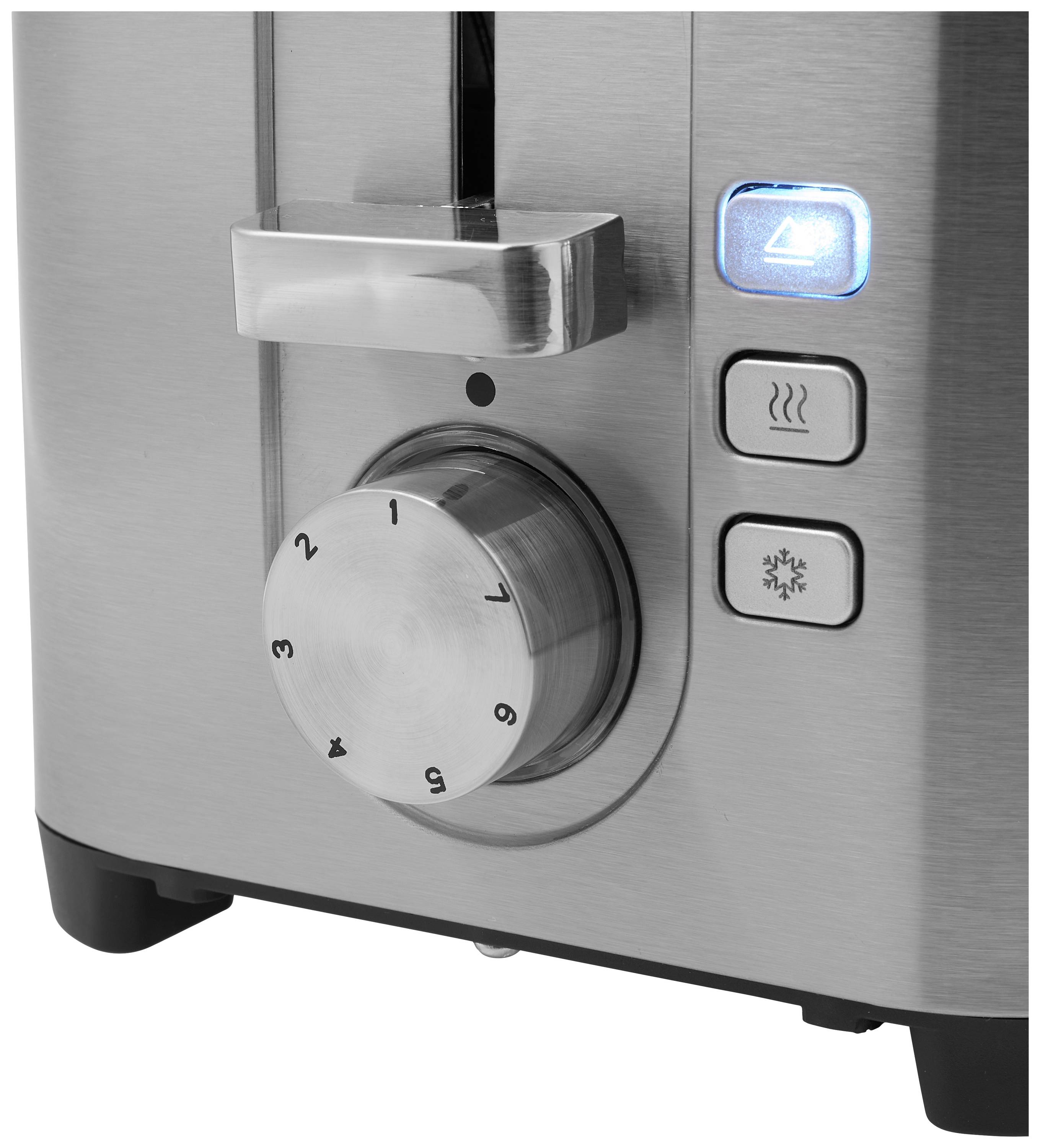 Close-up of a stainless steel toaster with a temperature dial ranging from 1 to 9 and three function buttons: Defrost, Toast, and Reheat.