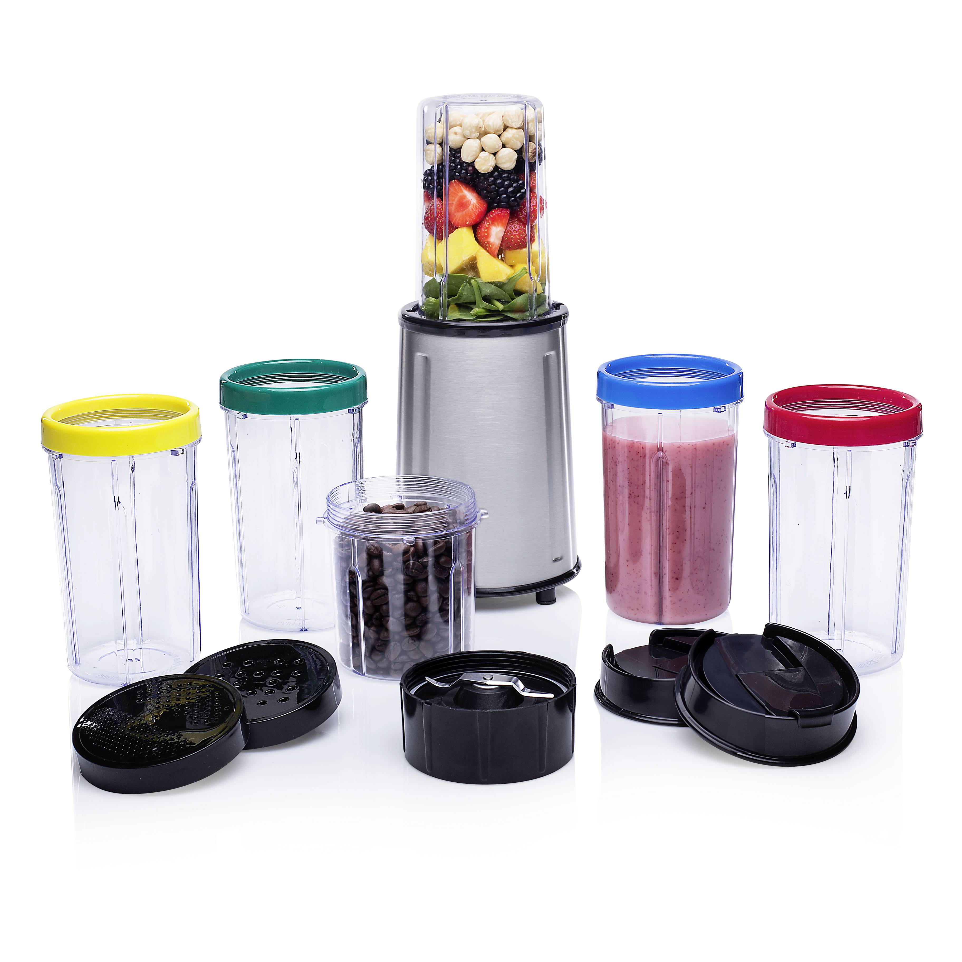 Blender with five beakers and fruit contents, surrounded by lids. Beakers with colourful covers, with one containing a raspberry smoothie.