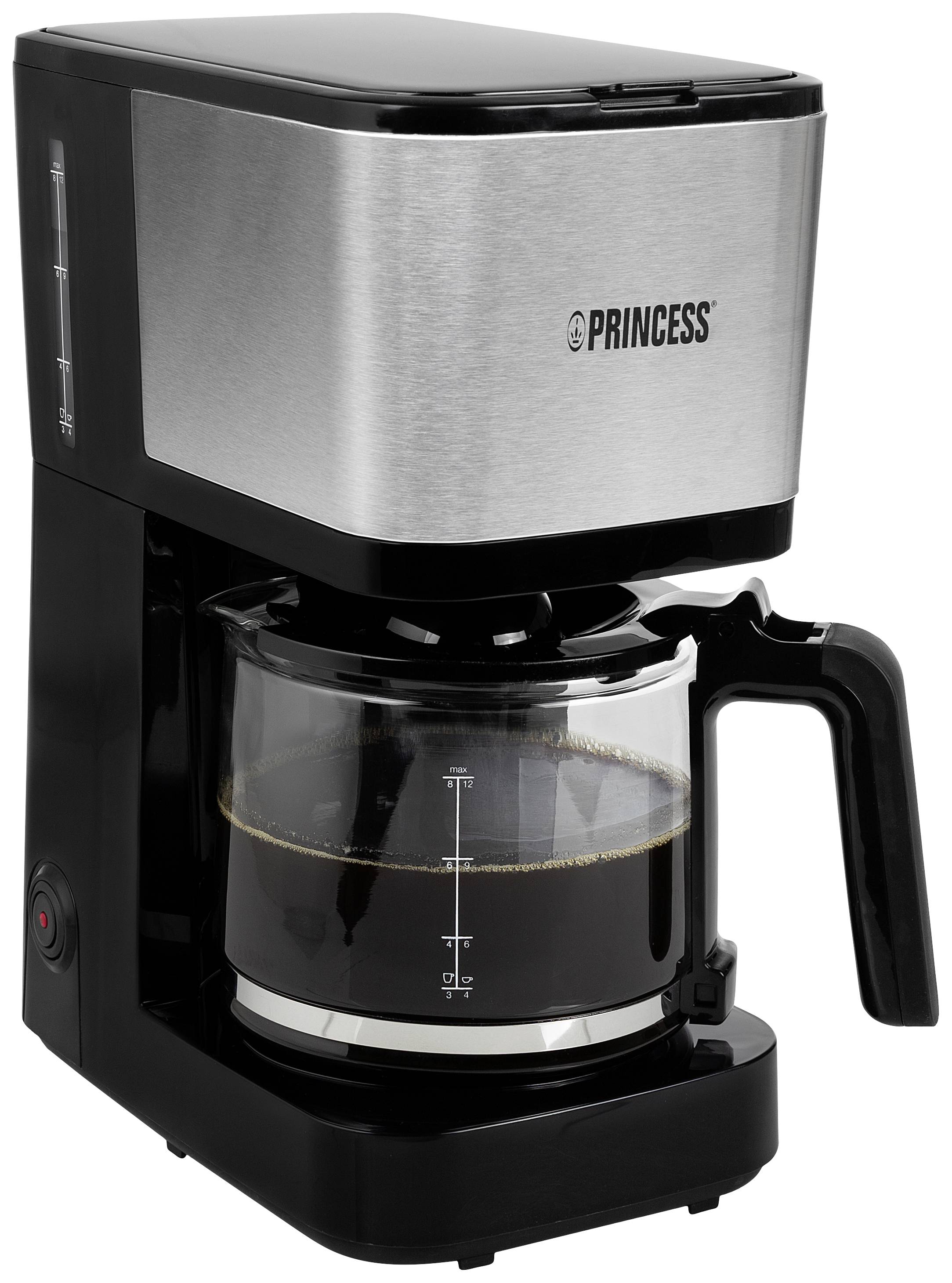A silver and black coffee machine with a glass carafe, half-filled with coffee, stands upright. It has a clear water level indicator.