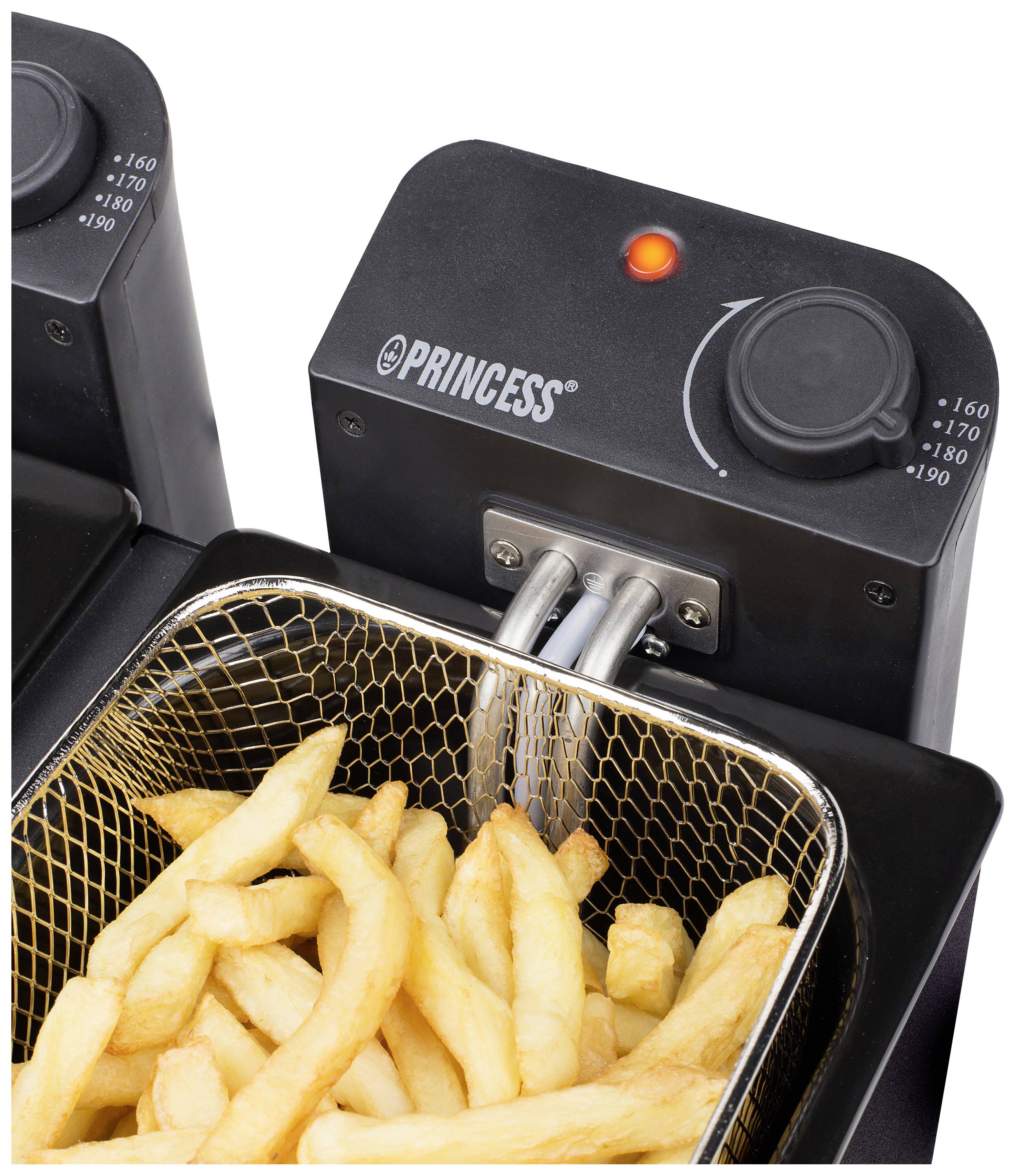 A deep-frying basket with golden yellow chips in a deep-fat fryer. The temperature control indicates 160 to 190 degrees Celsius.