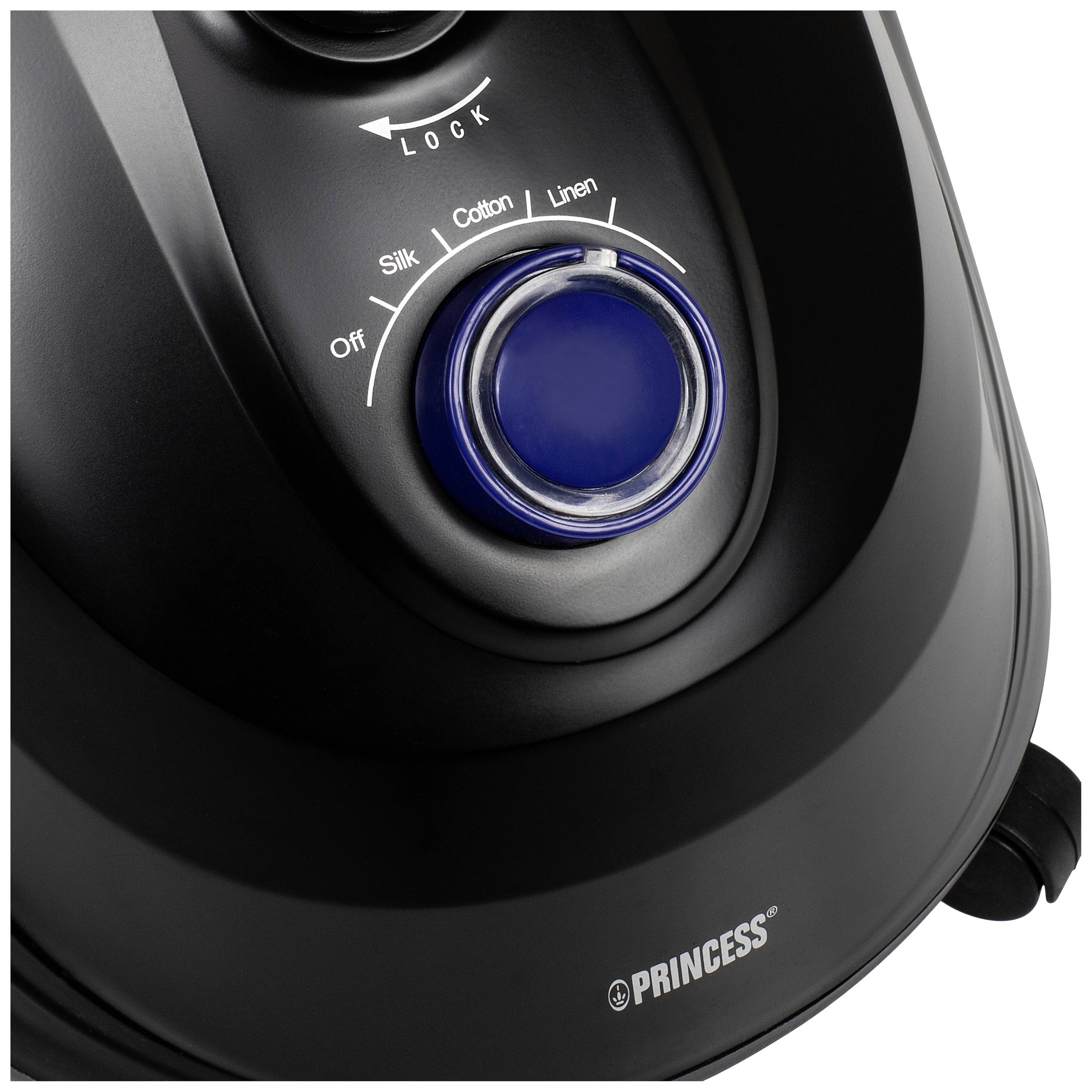 A close-up of a black tumble dryer with a blue rotary knob set to 'Cotton', showing various fabric options.