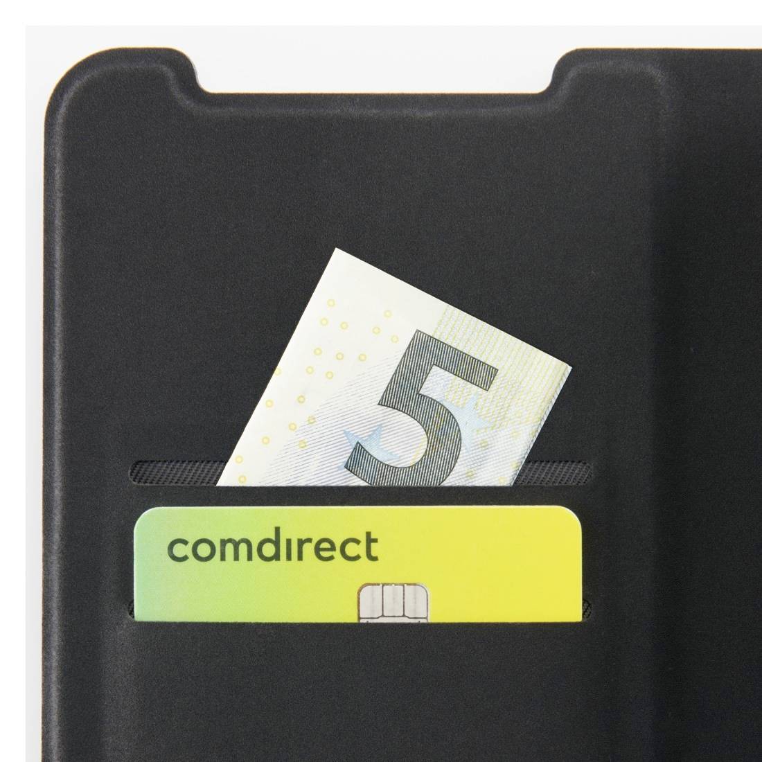 A banknote and a Comdirect card are wedged in a narrow slot of a black smartphone case.