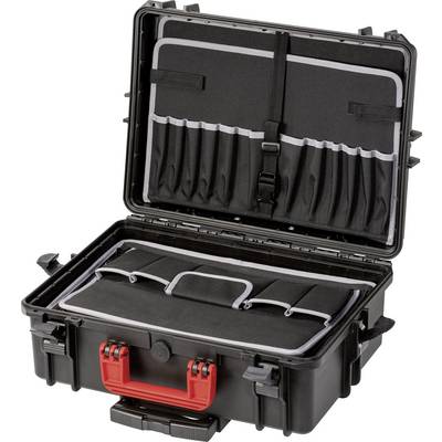 An open black hard-shell suitcase with a red handle reveals multiple compartments and pockets inside the lid for storage and organisation.