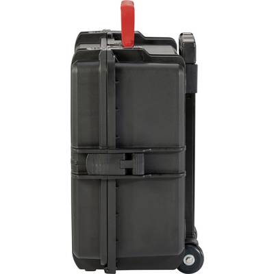 Black wheeled suitcase with a red handle, side view, standing on two wheels.