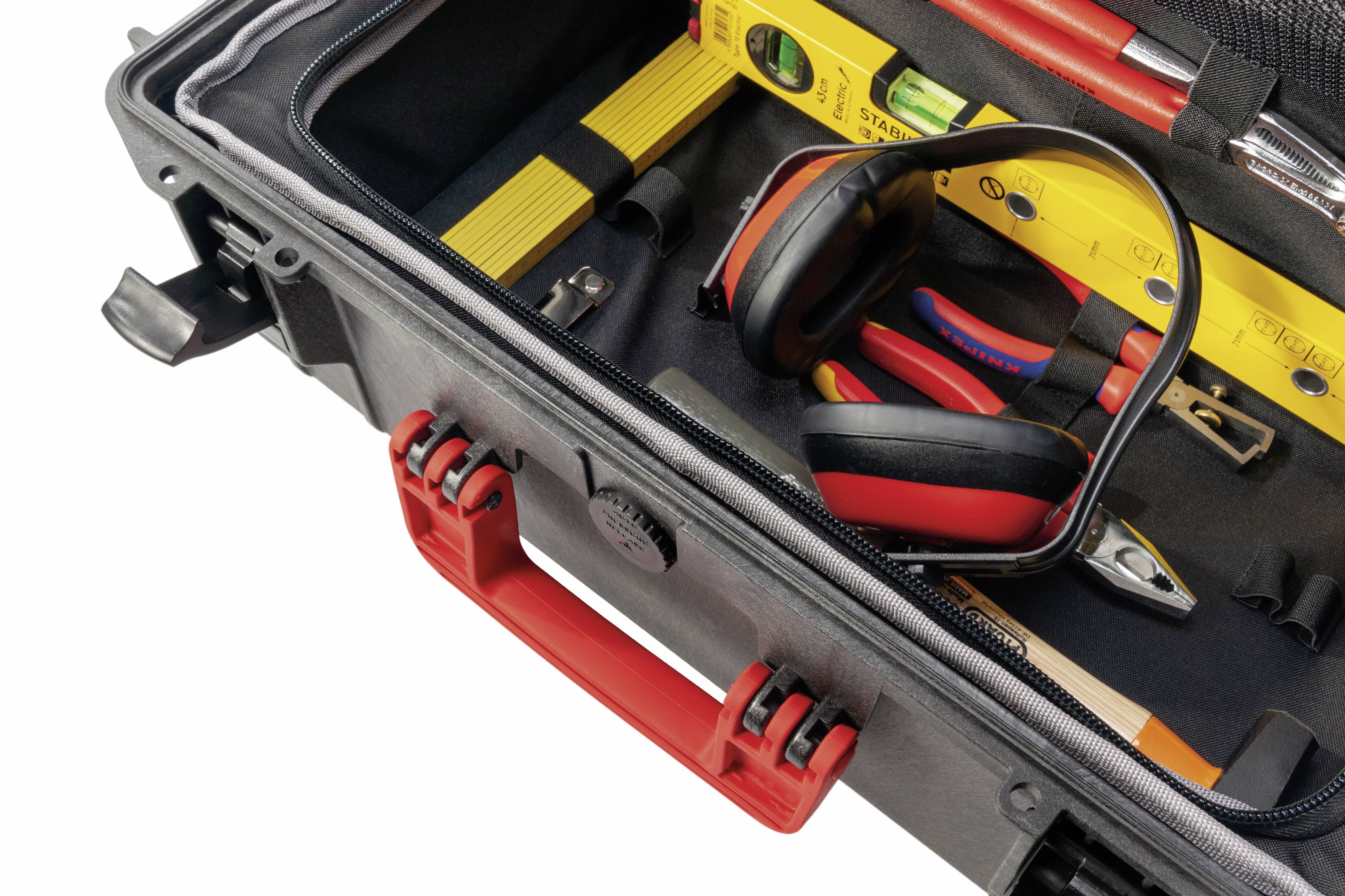 A toolkit with red handles, containing a spirit level, safety goggles and pliers. Perfectly organised for construction or DIY works.