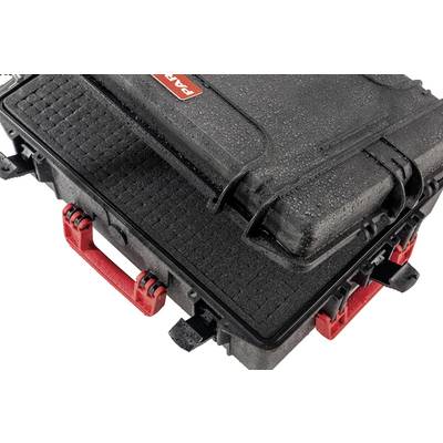 A black, sturdy suitcase with red handles and locks, slightly damp, is lying on top of another identical suitcase.