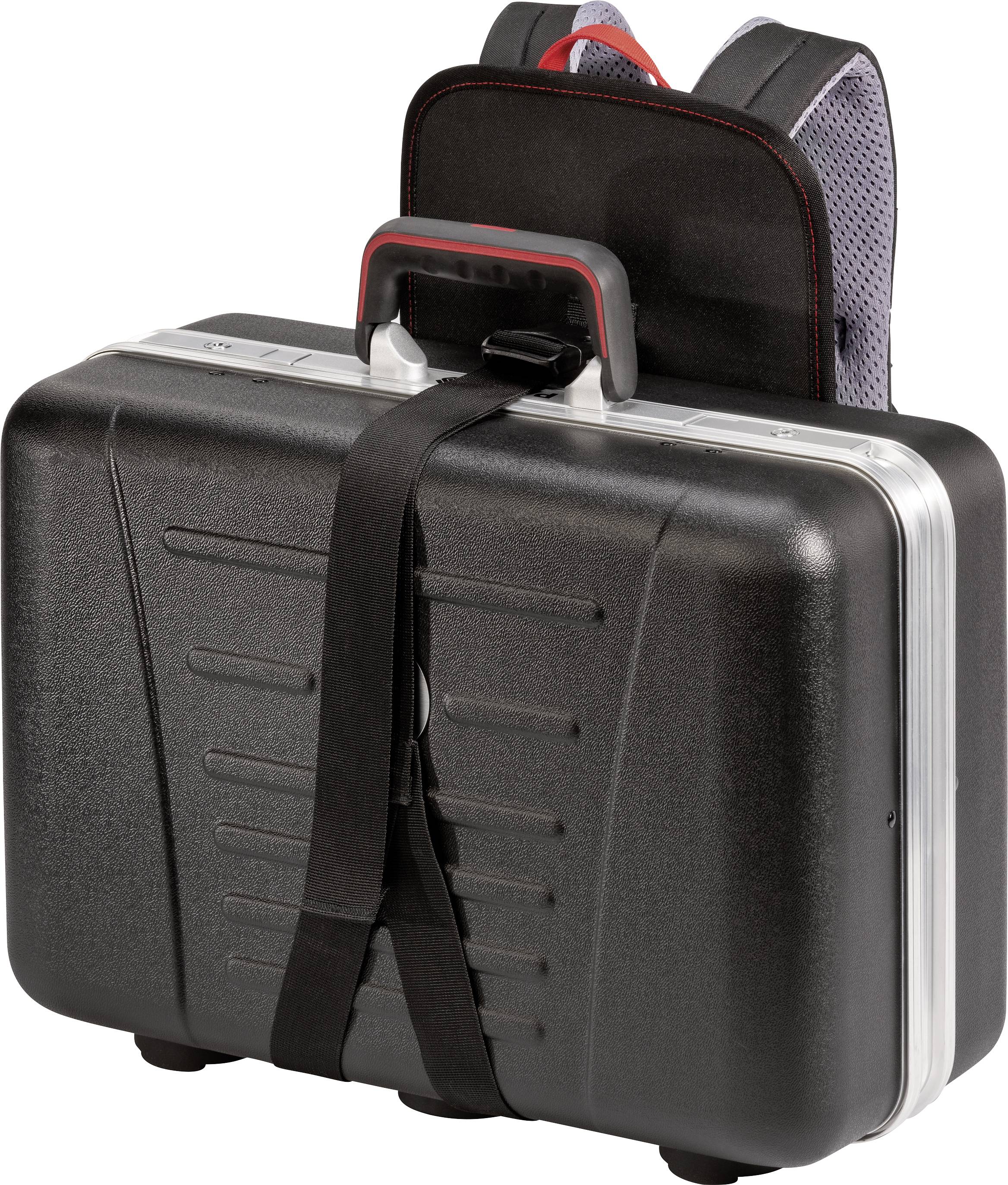 Black hard-shell suitcase with red handle, attached to a rucksack. The scene shows a practical transport solution.