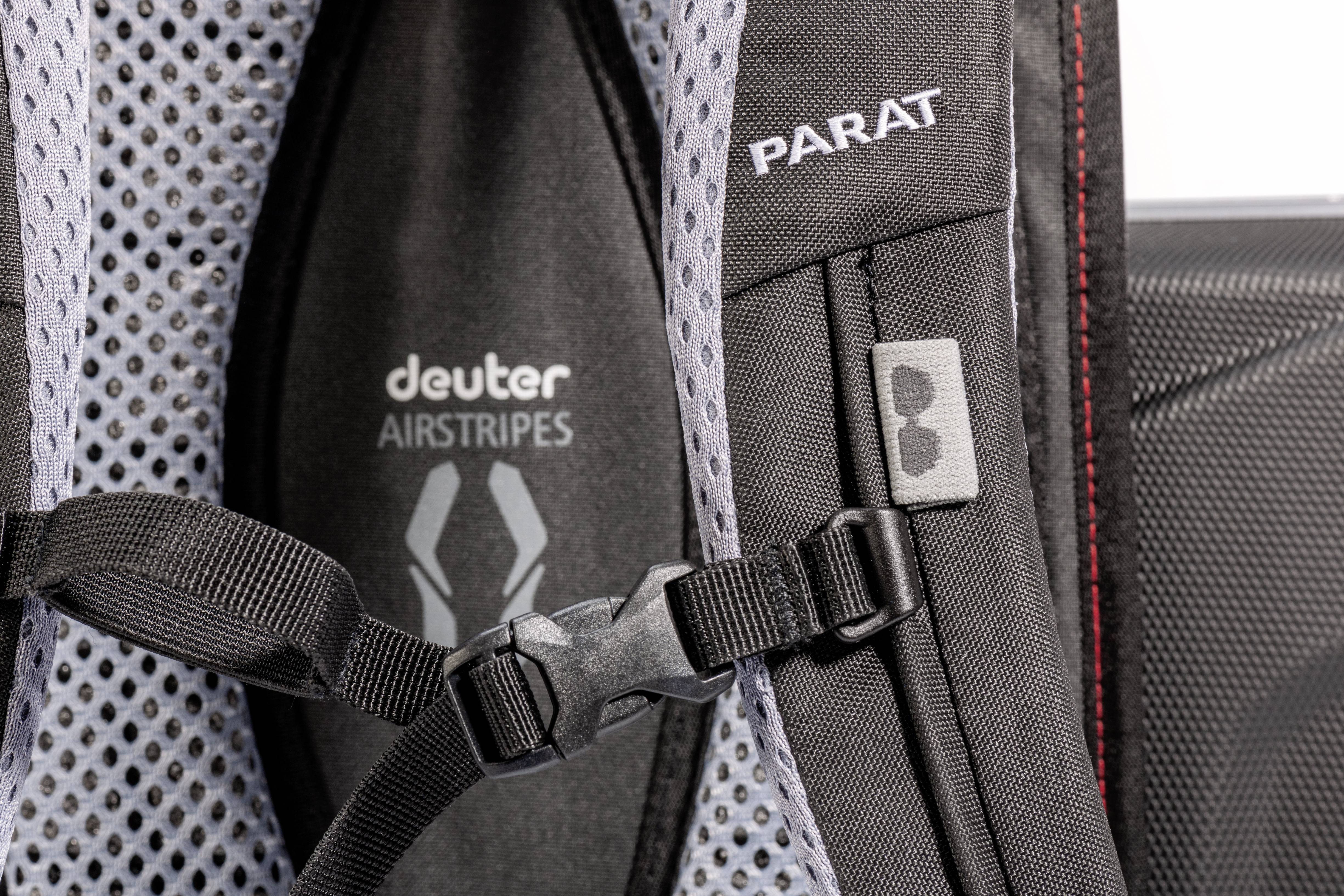 A rucksack with grey mesh fabric and black material. Brand logos are 'deuter AIRSTRIPES' and 'PARAT'.