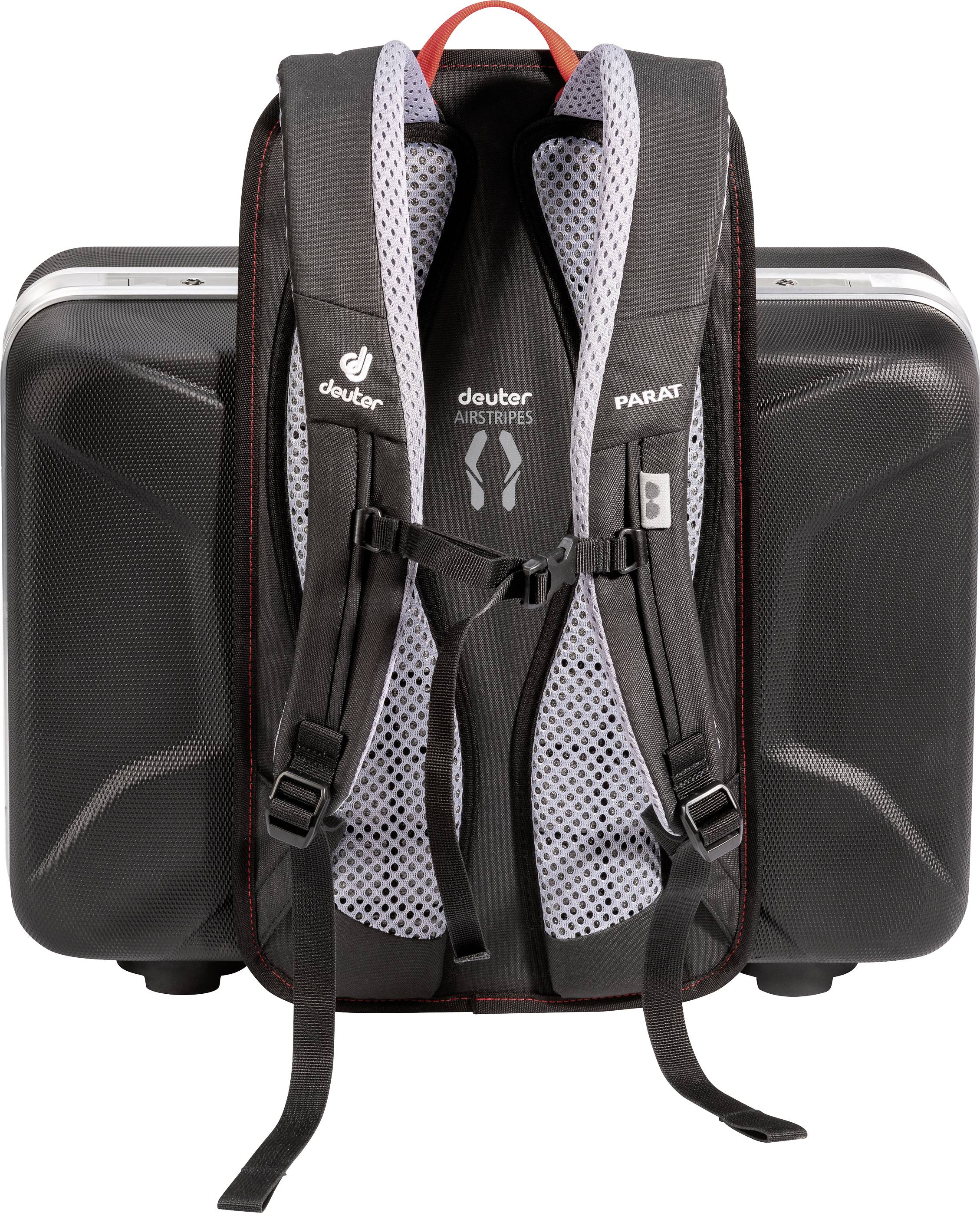 A black rucksack with grey, padded straps, attached to a robust, square suitcase with a smooth surface.