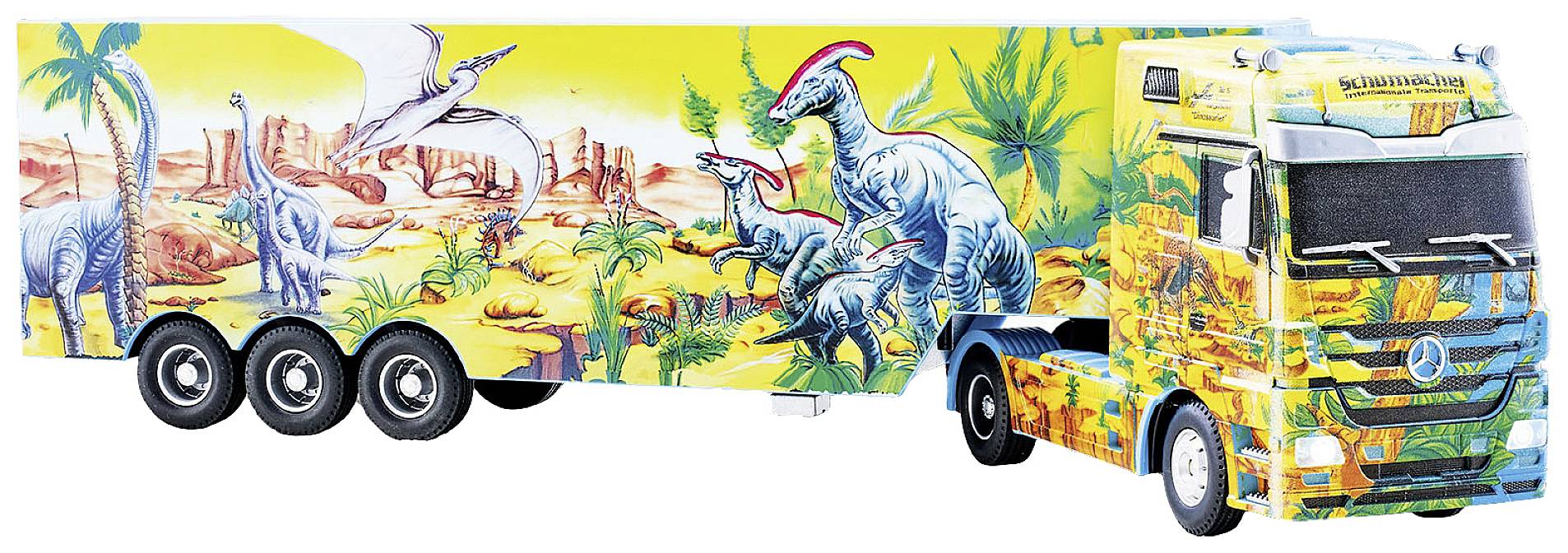 A model lorry with colourful dinosaur illustrations on the trailer and cab, depicting various dinosaurs in a desert landscape.