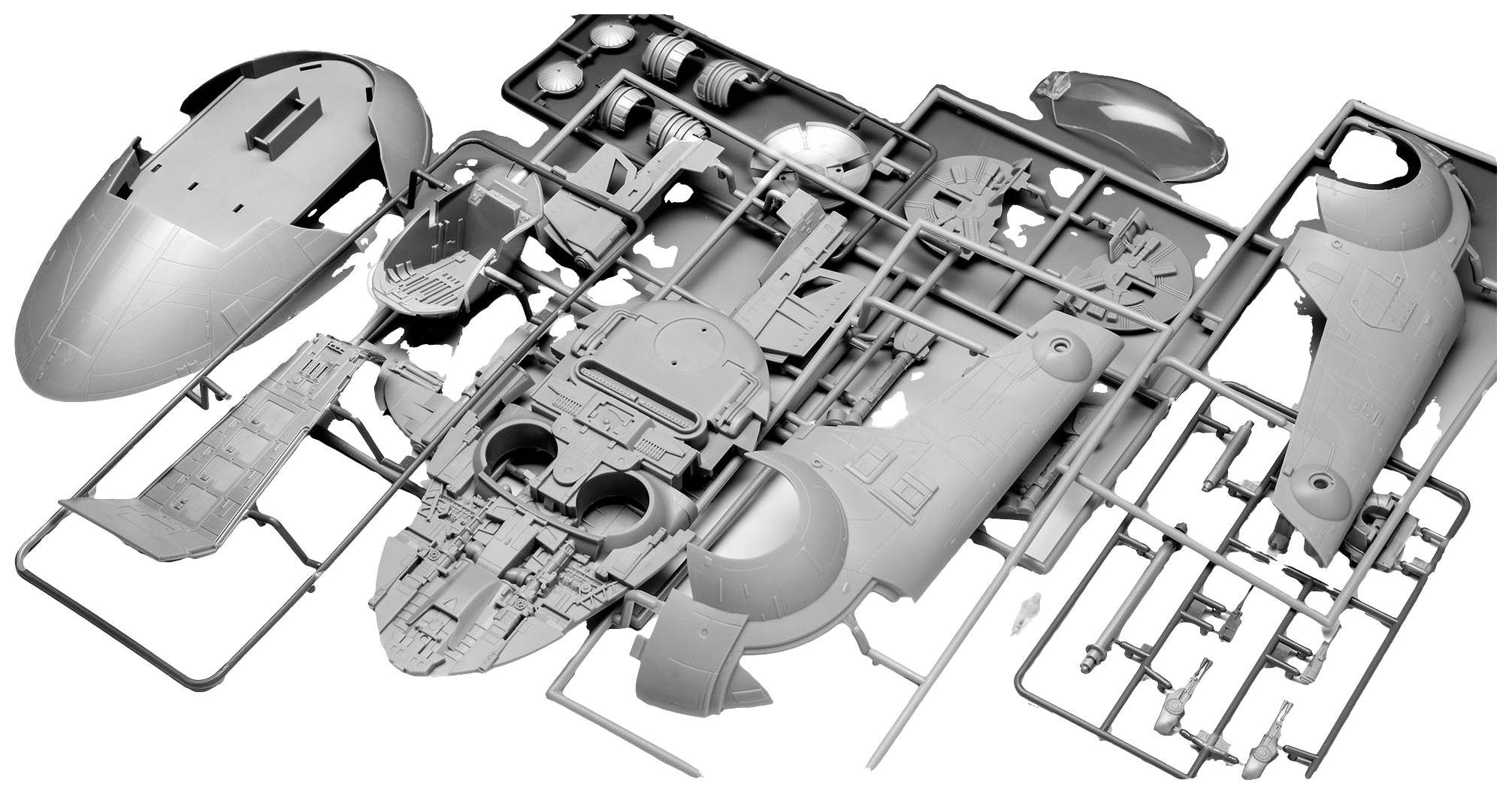Parts for a model aircraft on an injection moulding frame. Parts include fuselage, wings and cockpit. Model in unpainted condition.