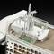 Upper section of a cruise ship model with details such as aerials, funnel and deck areas, on a black background.