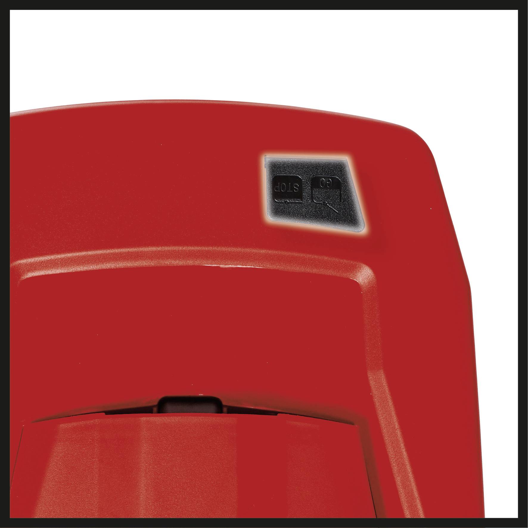 A red vacuum cleaner with a visible control panel showing a 'Stop' button, captured in a close-up shot.
