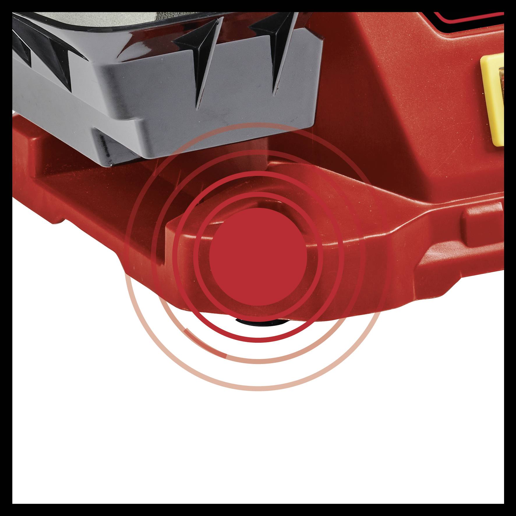 Close-up of a safety block with a non-slip surface and a prominent red warning symbol signalling a safety stop.