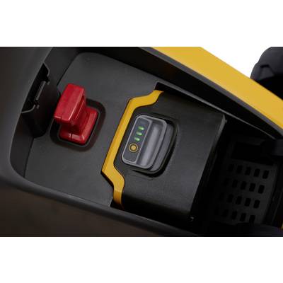 'Battery compartment with charging symbol and four green LEDs on a device. Next to it is a red lever.'