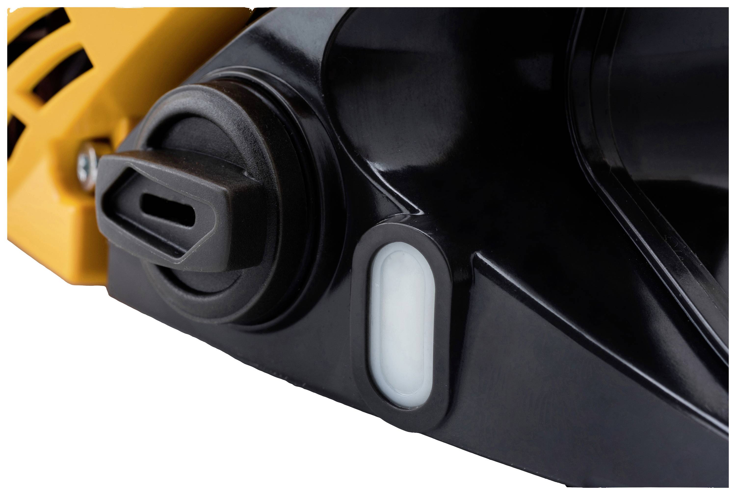 Close-up of a black plastic and metal component of a device with a yellow element in the background.